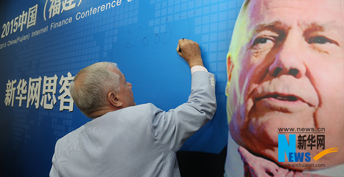 羅杰斯寄語新華網思客會，建議股民投資好的股票要看新華網。