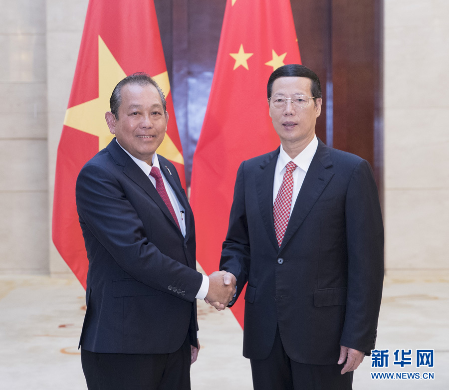  9月11日，中共中央政治局常委、國務院副總理張高麗在廣西南寧會見前來出席第十四屆中國－東盟博覽會和中國－東盟商務與投資峰會的越南常務副總理張和平。新華社記者王曄攝