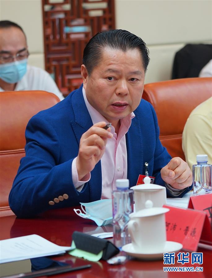 （兩會&middot;熱點畫報）（6）代表委員建言統籌做好經濟社會發展工作