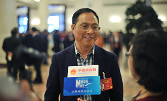 全國政協委員杜時貴接受采訪