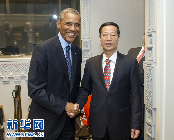9月23日，國(guó)家主席習(xí)近平特使、國(guó)務(wù)院副總理張高麗在紐約會(huì)見(jiàn)出席聯(lián)合國(guó)氣候峰會(huì)的美國(guó)總統(tǒng)奧巴馬。 新華社記者王曄攝