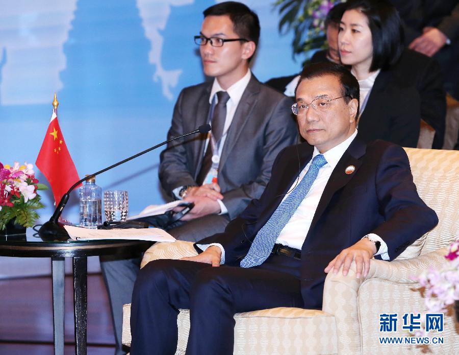 12月20日，中國國務(wù)院總理李克強在曼谷出席大湄公河次區(qū)域經(jīng)濟合作領(lǐng)導(dǎo)人第五次會議。 新華社記者 龐興雷 攝 